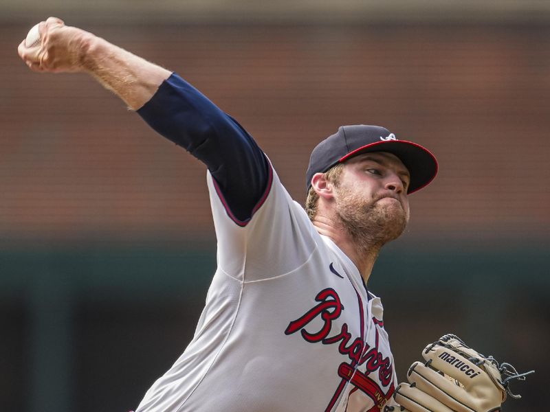 Sep 24, 2025; Cumberland, Georgia, USA; Atlanta Braves starting pitcher Bryce Elder (55) pitches against the Washington Nationals during the first inning at Truist Park. Mandatory Credit: Dale Zanine-Imagn Images