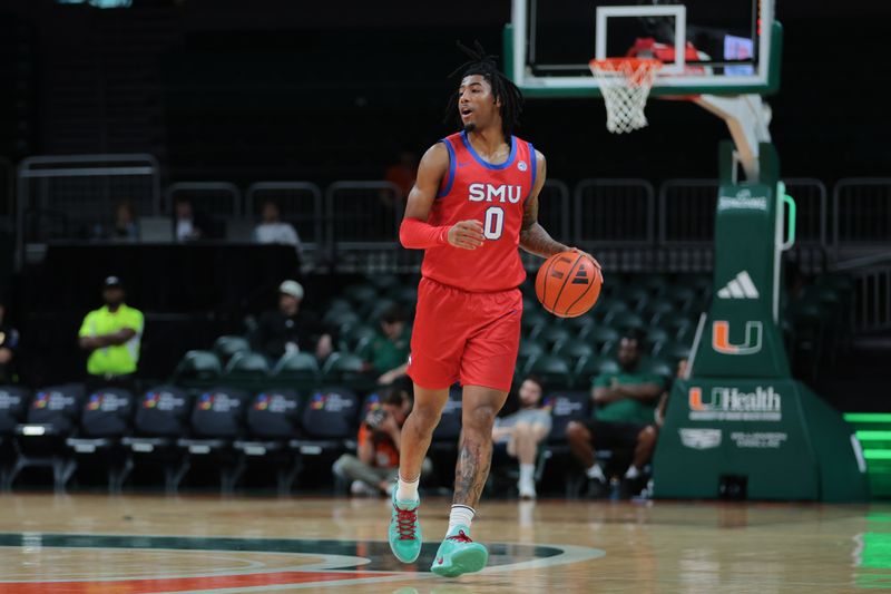 Jan 18, 2025; Coral Gables, Florida, USA; Southern Methodist Mustangs guard B.J. Edwards (0) dribbles the basketball against the Miami Hurricanes during the first half at Watsco Center. Mandatory Credit: Sam Navarro-Imagn Images
