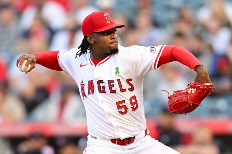 May 25, 2024; Anaheim, California, USA; Los Angeles Angels pitcher José Soriano (59) throws a pitch against the Cleveland Guardians during the first inning at Angel Stadium. Mandatory Credit: Jonathan Hui-USA TODAY Sports