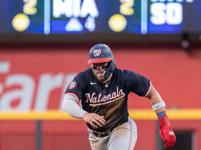 Aug 23, 2024; Cumberland, Georgia, USA; Washington Nationals third base Andrés Chaparro (19) runs to third base after a hit against the Atlanta Braves during the fourth inning at Truist Park. Mandatory Credit: Jordan Godfree-USA TODAY Sports