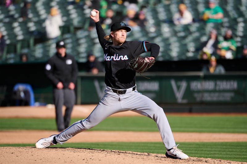 May 4, 2024; Oakland, California, USA; Miami Marlins pitcher Darren McCaughan (47) throws a pitch against the Oakland Athletics during the fourth inning at Oakland-Alameda County Coliseum. Mandatory Credit: Robert Edwards-USA TODAY Sports