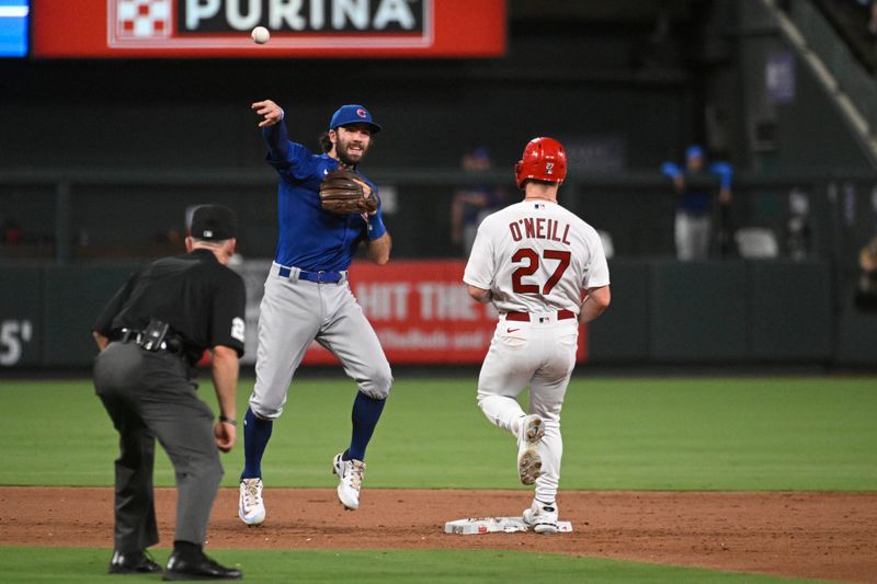 Jul 27, 2023; St. Louis, Missouri, USA; St. Louis Cardinals left fielder Tyler O'Neill (27) is out at second as Chicago Cubs shortstop Dansby Swanson (7) turns a double play in the fifth inning at Busch Stadium. Mandatory Credit: Joe Puetz-USA TODAY Sports