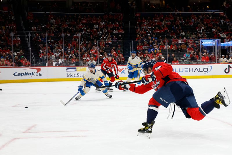 Feb 27, 2025; Washington, District of Columbia, USA; Washington Capitals left wing Alex Ovechkin (8) shoots the puck against the St. Louis Blues in the first period at Capital One Arena. Mandatory Credit: Geoff Burke-Imagn Images