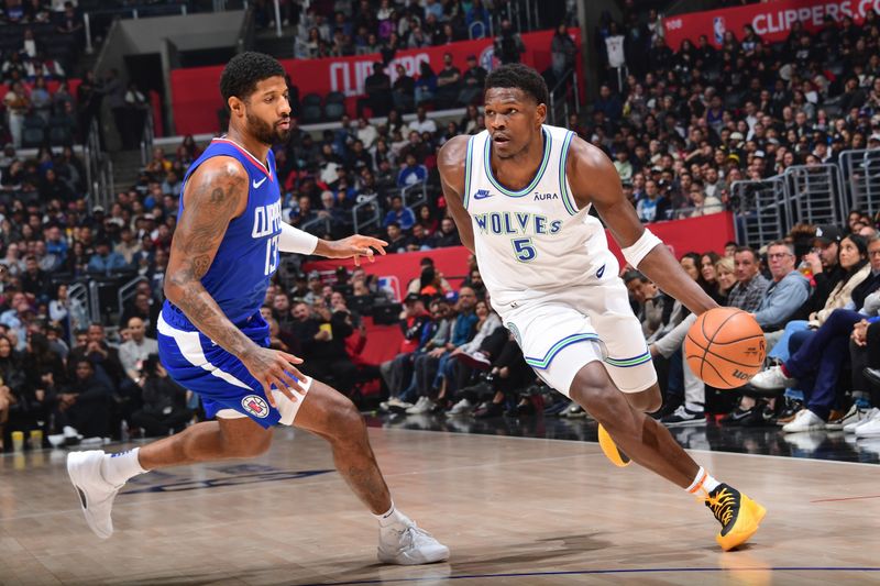 LOS ANGELES, CA - FEBRUARY 12:  Anthony Edwards #5 of the Minnesota Timberwolves goes to the basket during the game on February 12, 2024 at Crypto.Com Arena in Los Angeles, California. NOTE TO USER: User expressly acknowledges and agrees that, by downloading and/or using this Photograph, user is consenting to the terms and conditions of the Getty Images License Agreement. Mandatory Copyright Notice: Copyright 2024 NBAE (Photo by Adam Pantozzi/NBAE via Getty Images)