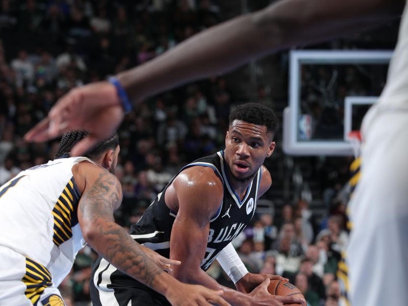 MILWAUKEE, WI - NOVEMBER 22:  Giannis Antetokounmpo #34 of the Milwaukee Bucks looks to pass the ball during the game against the Indiana Pacers during a Emirates NBA Cup on November 22, 2024 at Fiserv Forum Center in Milwaukee, Wisconsin. NOTE TO USER: User expressly acknowledges and agrees that, by downloading and or using this Photograph, user is consenting to the terms and conditions of the Getty Images License Agreement. Mandatory Copyright Notice: Copyright 2024 NBAE (Photo by Gary Dineen/NBAE via Getty Images).