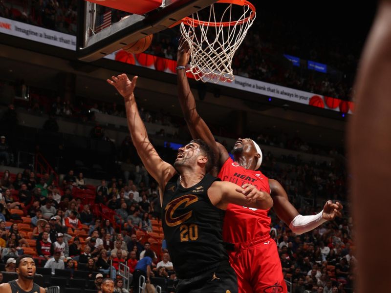 MIAMI, FL - DECEMBER 8: Georges Niang #20 of the Cleveland Cavaliers shoots the ball during the game against the Miami Heat on December 8, 2024 at Kaseya Center in Miami, Florida. NOTE TO USER: User expressly acknowledges and agrees that, by downloading and or using this Photograph, user is consenting to the terms and conditions of the Getty Images License Agreement. Mandatory Copyright Notice: Copyright 2024 NBAE (Photo by Issac Baldizon/NBAE via Getty Images)