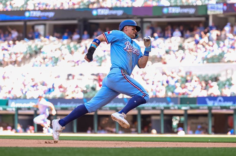 May 4, 2025; Arlington, Texas, USA;  Texas Rangers third baseman Josh Jung (6) rounds third base and scores during the eighth inning against the Seattle Mariners at Globe Life Field. Mandatory Credit: Kevin Jairaj-Imagn Images