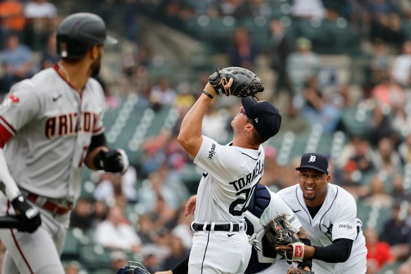 Jun 11, 2023; Detroit, Michigan, USA; Detroit Tigers first baseman Spencer Torkelson (20) makes a catch in the sixth inning against the Arizona Diamondbacks at Comerica Park. Mandatory Credit: Rick Osentoski-USA TODAY Sports