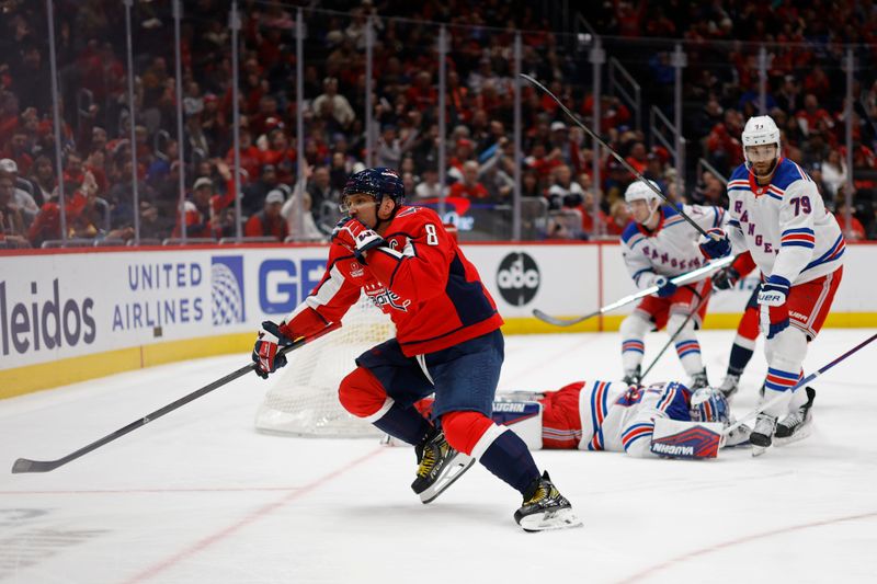 Jan 4, 2025; Washington, District of Columbia, USA; Washington Capitals left wing Alex Ovechkin (8) celebrates after scoring a goal on New York Rangers goaltender Jonathan Quick (32) in the third period at Capital One Arena. Mandatory Credit: Geoff Burke-Imagn Images