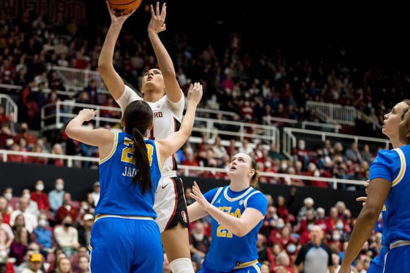 Feb 20, 2023; Stanford, California, USA;  UCLA Bruins forward Gabriela Jaquez (23) defends Stanford Cardinal center Lauren Betts (51) during the first half at Maples Pavilion. Mandatory Credit: John Hefti-USA TODAY Sports