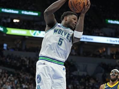 MINNEAPOLIS, MN -  DECEMBER 16: Anthony Edwards #5 of the Minnesota Timberwolves rebounds during the game against the Indiana Pacers on December 16, 2023 at Target Center in Minneapolis, Minnesota. NOTE TO USER: User expressly acknowledges and agrees that, by downloading and or using this Photograph, user is consenting to the terms and conditions of the Getty Images License Agreement. Mandatory Copyright Notice: Copyright 2023 NBAE (Photo by Jordan Johnson/NBAE via Getty Images)