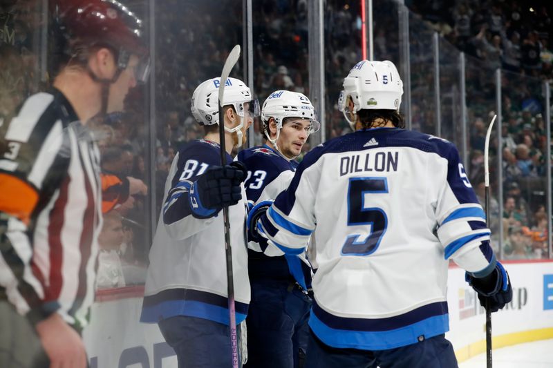 Apr 6, 2024; Saint Paul, Minnesota, USA;  Winnipeg Jets left wing Kyle Connor (81) celebrates with teammates after scoring a goal against the Minnesota Wild during the first period at Xcel Energy Center. Mandatory Credit: Bruce Fedyck-USA TODAY Sports