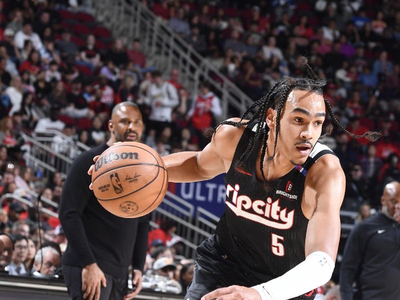 HOUSTON, TX -NOVEMBER 23:  Dalano Banton #5 of the Portland Trail Blazers dribbles the ball during the game against the Houston Rockets on November 23, 2024 at the Toyota Center in Houston, Texas. NOTE TO USER: User expressly acknowledges and agrees that, by downloading and or using this photograph, User is consenting to the terms and conditions of the Getty Images License Agreement. Mandatory Copyright Notice: Copyright 2024 NBAE (Photo by Logan Riely/NBAE via Getty Images)