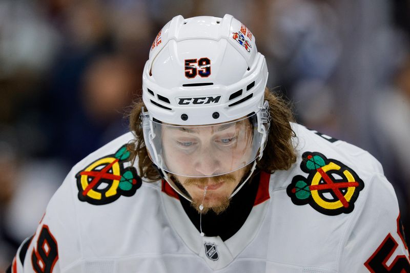 Oct 28, 2024; Denver, Colorado, USA; Chicago Blackhawks left wing Tyler Bertuzzi (59) in the third period against the Colorado Avalanche at Ball Arena. Mandatory Credit: Isaiah J. Downing-Imagn Images