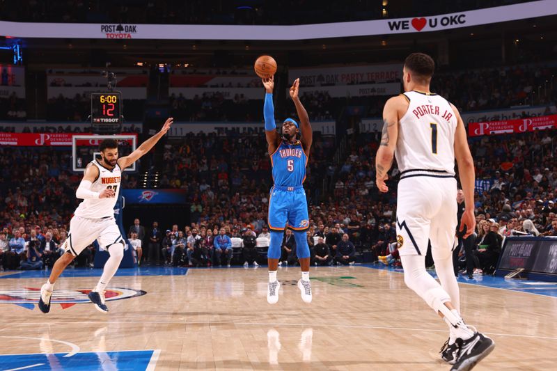 OKLAHOMA CITY, OK - JANUARY 31: Luguentz Dort #5 of the Oklahoma City Thunder shoots a three point basket during the game against the Denver Nuggets on January 31, 2024 at Paycom Arena in Oklahoma City, Oklahoma. NOTE TO USER: User expressly acknowledges and agrees that, by downloading and or using this photograph, User is consenting to the terms and conditions of the Getty Images License Agreement. Mandatory Copyright Notice: Copyright 2024 NBAE (Photo by Zach Beeker/NBAE via Getty Images)