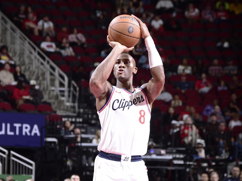 HOUSTON, TX - NOVEMBER 15: Kris Dunn #8 of the LA Clippers shoots the ball during the game against the Houston Rockets during the Emirates NBA Cup game on November 15, 2024 at the Toyota Center in Houston, Texas. NOTE TO USER: User expressly acknowledges and agrees that, by downloading and or using this photograph, User is consenting to the terms and conditions of the Getty Images License Agreement. Mandatory Copyright Notice: Copyright 2024 NBAE (Photo by Logan Riely/NBAE via Getty Images)