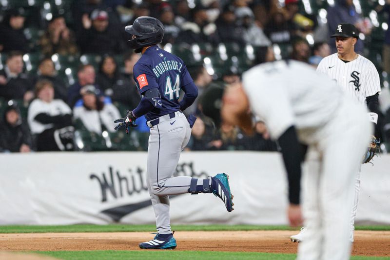 May 19, 2025; Chicago, Illinois, USA; Seattle Mariners center fielder Julio Rodríguez (44) rounds the bases after hitting a grand slam against the Chicago White Sox during the eight inning at Rate Field. Mandatory Credit: Kamil Krzaczynski-Imagn Images