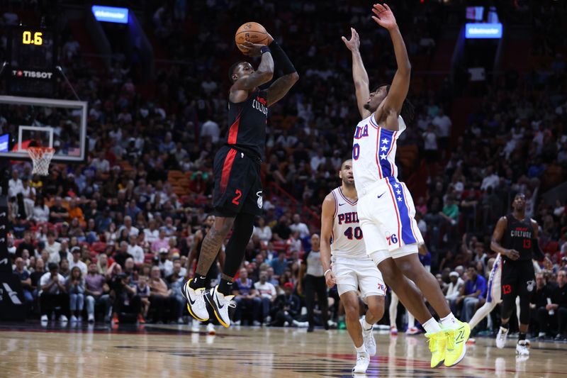 MIAMI, FLORIDA - APRIL 04: Terry Rozier #2 of the Miami Heat makes a buzzer beater shot before halftime during a game against the Philadelphia 76ers at Kaseya Center on April 04, 2024 in Miami, Florida. NOTE TO USER: User expressly acknowledges and agrees that, by downloading and or using this photograph, User is consenting to the terms and conditions of the Getty Images License Agreement. (Photo by Megan Briggs/Getty Images)