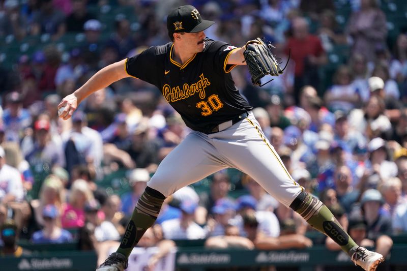 May 17, 2024; Chicago, Illinois, USA; Pittsburgh Pirates pitcher Paul Skenes (30) throws the ball against the Chicago Cubs during the first inning at Wrigley Field. Mandatory Credit: David Banks-USA TODAY Sports