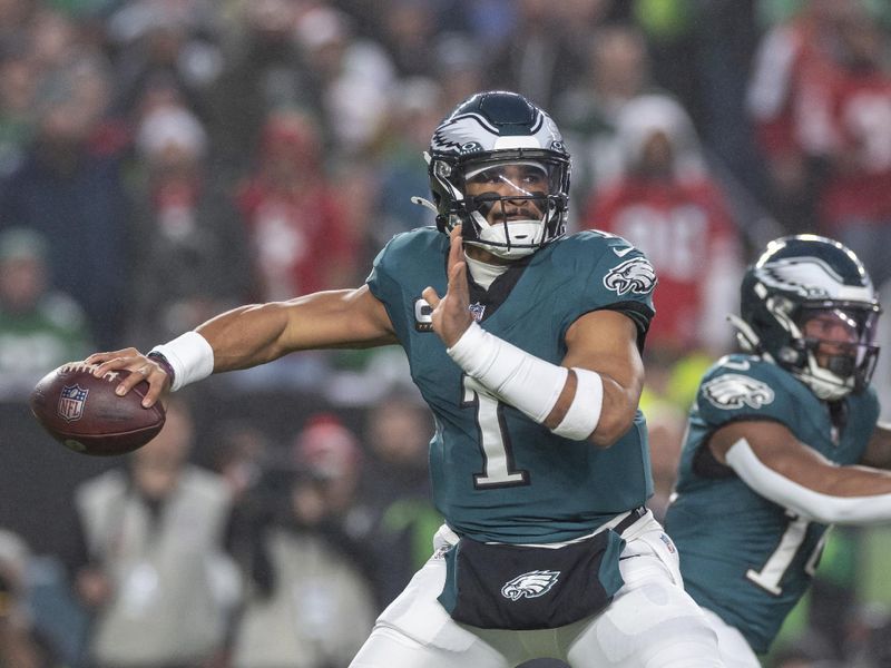 Philadelphia Eagles quarterback Jalen Hurts (1) drops back to pass against the San Francisco 49ers in an NFL football game, Sunday, Dec. 3, 2023, in Philadelphia, PA. 49ers defeat the Eagles 42-19. (AP Photo/Jeff Lewis)