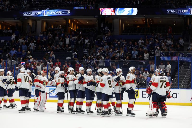 Apr 30, 2025; Tampa, Florida, USA; Florida Panthers goaltender Sergei Bobrovsky (72) and teammates celebrate after they best the Tampa Bay Lightning during game five of the first round of the 2025 Stanley Cup Playoffs at Amalie Arena. Mandatory Credit: Kim Klement Neitzel-Imagn Images