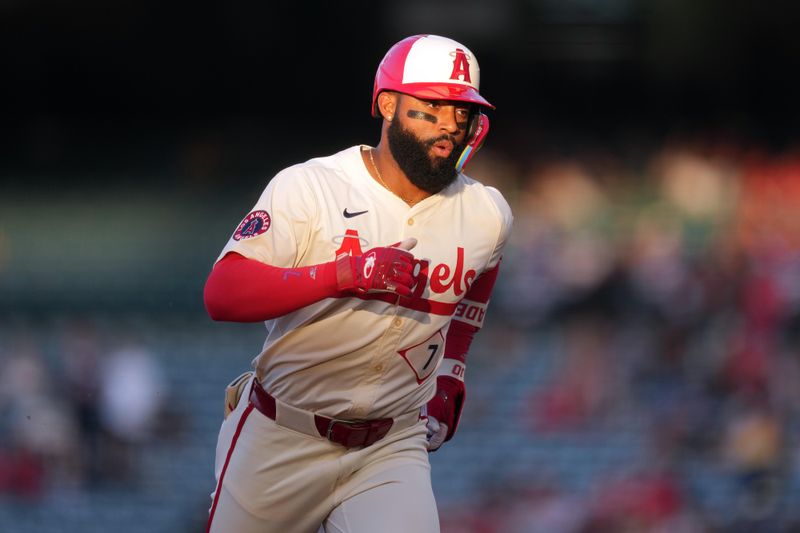 Jun 7, 2025; Anaheim, California, USA; Los Angeles Angels center fielder Jo Adell (7) runs the bases after hitting a home run in the second inning against the Seattle Mariners at Angel Stadium. Mandatory Credit: Kirby Lee-Imagn Images