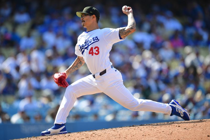 May 19, 2024; Los Angeles, California, USA; Los Angeles Dodgers pitcher Anthony Banda (43) throws against the Cincinnati Reds during the tenth inning at Dodger Stadium. Mandatory Credit: Gary A. Vasquez-USA TODAY Sports