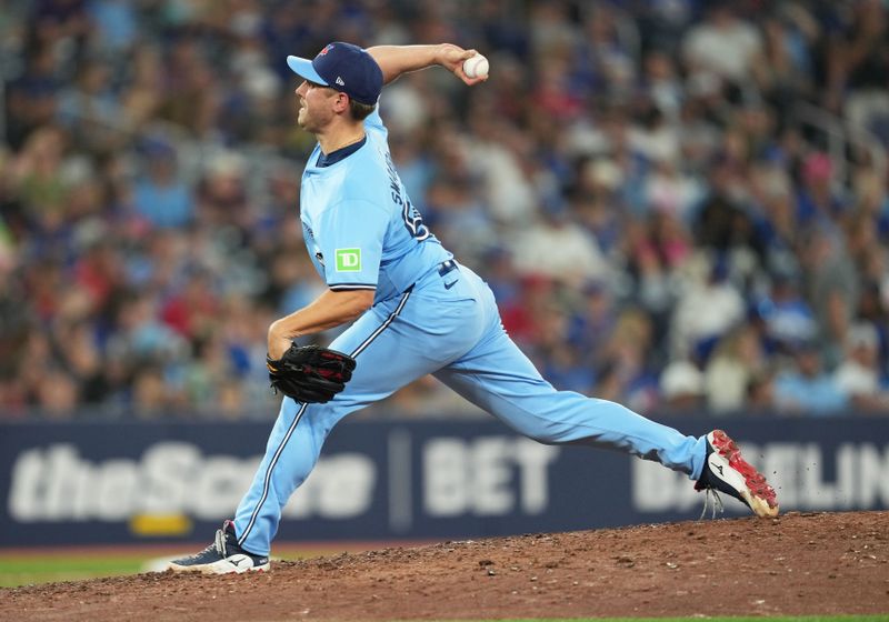 Jul 23, 2024; Toronto, Ontario, CAN; Toronto Blue Jays relief pitcher Erik Swanson (50) throws a pitch against the Tampa Bay Rays during the ninth inning at Rogers Centre. Mandatory Credit: Nick Turchiaro-USA TODAY Sports