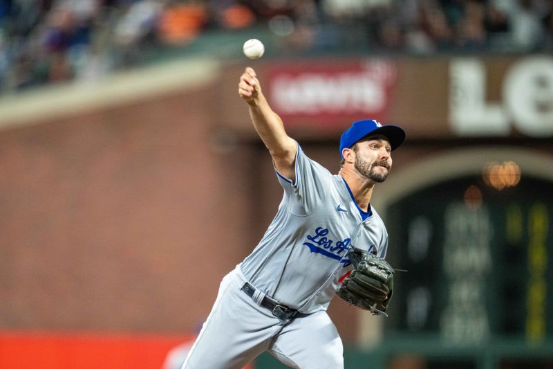 May 13, 2024; San Francisco, California, USA; Los Angeles Dodgers pitcher J.P. Feyereisen (45) delivers a pitch against the San Francisco Giants during the tenth inning at Oracle Park. Mandatory Credit: Neville E. Guard-USA TODAY Sports