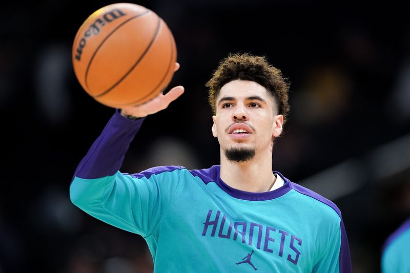 INDIANAPOLIS, INDIANA - OCTOBER 17: LaMelo Ball #1 of the Charlotte Hornets warms up before a preseason game against the Indiana Pacers at Gainbridge Fieldhouse on October 17, 2024 in Indianapolis, Indiana. NOTE TO USER: User expressly acknowledges and agrees that, by downloading and or using this photograph, User is consenting to the terms and conditions of the Getty Images License Agreement. (Photo by Dylan Buell/Getty Images)