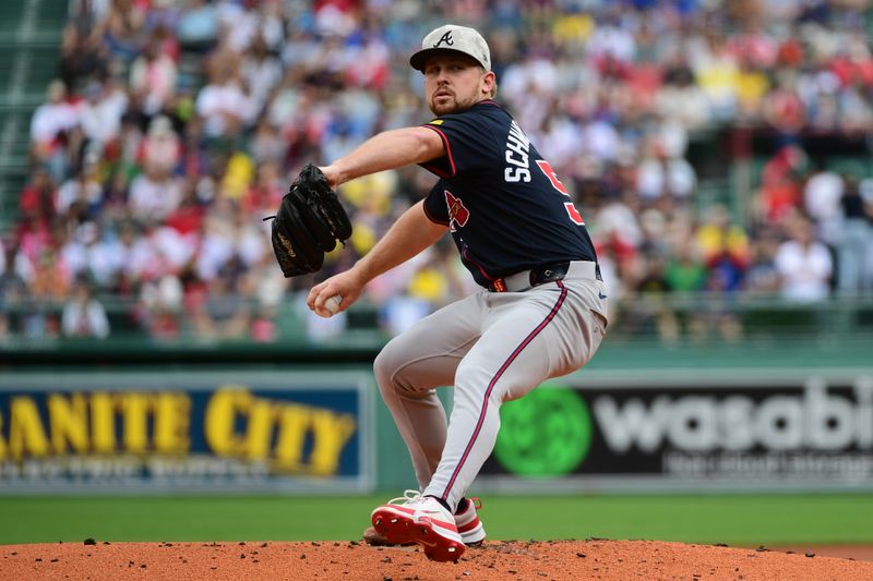 May 18, 2025; Boston, Massachusetts, USA;  Atlanta Braves starting pitcher Spencer Schwellenbach (56) pitches during the first inning against the Boston Red Sox at Fenway Park. Mandatory Credit: Bob DeChiara-Imagn Images