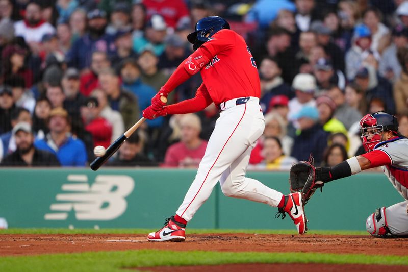 May 10, 2024; Boston, Massachusetts, USA; Boston Red Sox shortstop Romy Gonzalez (23) hits a single against the Washington Nationals during the second inning at Fenway Park. Mandatory Credit: Gregory Fisher-USA TODAY Sports