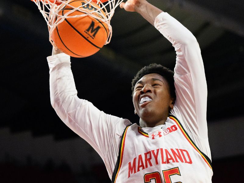 Dec 4, 2024; College Park, Maryland, USA; Maryland Terrapins center Derik Queen (25) dunks the ball during the second half against the Ohio State Buckeyes at Xfinity Center. Mandatory Credit: Reggie Hildred-Imagn Images