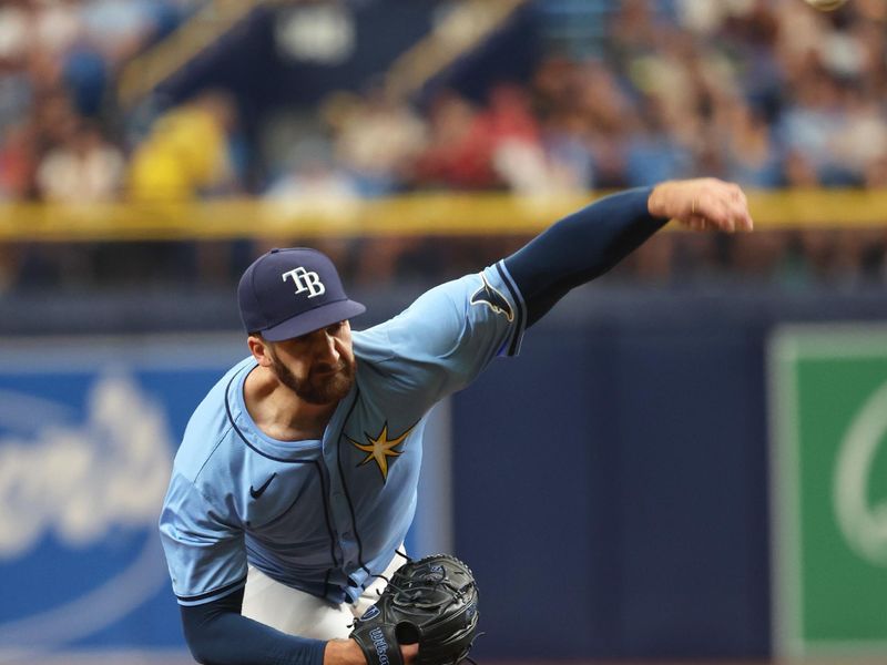 Jul 14, 2024; St. Petersburg, Florida, USA;  Tampa Bay Rays pitcher Colin Poche (38) throws a pitch against the Cleveland Guardians during the seventh inning at Tropicana Field. Mandatory Credit: Kim Klement Neitzel-USA TODAY Sports