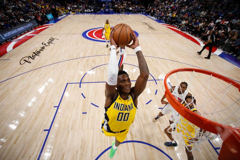 DETROIT, MI - OCTOBER 23: Bennedict Mathurin #00 of the Indiana Pacers dunks the ball during the game against the Detroit Pistons on October 23, 2024 at Little Caesars Arena in Detroit, Michigan. NOTE TO USER: User expressly acknowledges and agrees that, by downloading and/or using this photograph, User is consenting to the terms and conditions of the Getty Images License Agreement. Mandatory Copyright Notice: Copyright 2024 NBAE (Photo by Brian Sevald/NBAE via Getty Images)