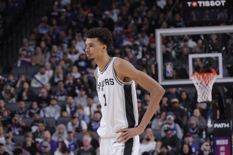 SACRAMENTO, CA - DECEMBER 1: Victor Wembanyama #1 of the San Antonio Spurs looks on during the game against the Sacramento Kings on December 1, 2024 at Golden 1 Center in Sacramento, California. NOTE TO USER: User expressly acknowledges and agrees that, by downloading and or using this Photograph, user is consenting to the terms and conditions of the Getty Images License Agreement. Mandatory Copyright Notice: Copyright 2024 NBAE (Photo by Rocky Widner/NBAE via Getty Images)