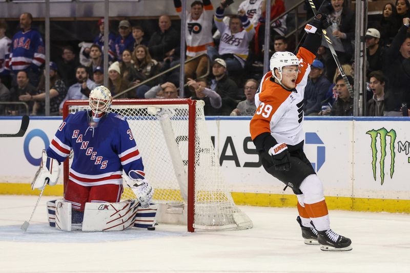 Feb 26, 2026; New York, New York, USA;  Philadelphia Flyers right wing Matvei Michkov (39) celebrates after scoring a the game winning goal in overtime against the New York Rangers at Madison Square Garden. Mandatory Credit: Wendell Cruz-Imagn Images