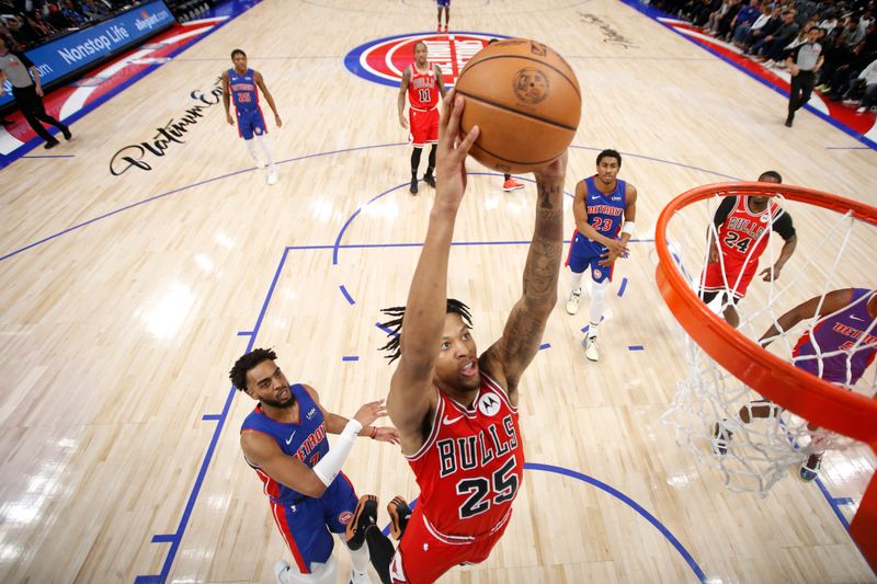 DETROIT, MI - APRIL 11: Dalen Terry #25 of the Chicago Bulls dunks the ball during the game against the Detroit Pistons on April 11, 2024 at Little Caesars Arena in Detroit, Michigan. NOTE TO USER: User expressly acknowledges and agrees that, by downloading and/or using this photograph, User is consenting to the terms and conditions of the Getty Images License Agreement. Mandatory Copyright Notice: Copyright 2024 NBAE (Photo by Brian Sevald/NBAE via Getty Images)