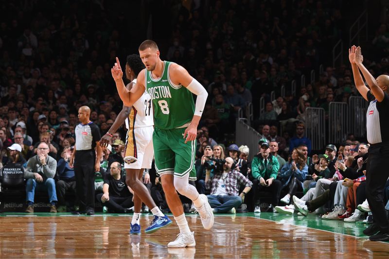 BOSTON, MA - JANUARY 12: Kristaps Porzingis #8 of the Boston Celtics celebrates during the game against the New Orleans Pelicans on January 12, 2025 at TD Garden in Boston, Massachusetts. NOTE TO USER: User expressly acknowledges and agrees that, by downloading and/or using this Photograph, user is consenting to the terms and conditions of the Getty Images License Agreement. Mandatory Copyright Notice: Copyright 2025 NBAE (Photo by Brian Babineau/NBAE via Getty Images)