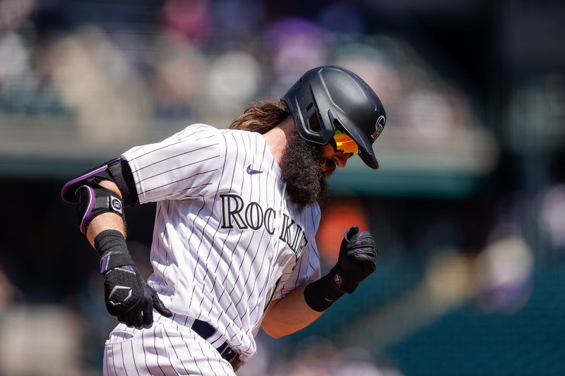 Aug 20, 2023; Denver, Colorado, USA; Colorado Rockies designated hitter Charlie Blackmon (19) rounds the bases on a solo home run in the third inning against the Chicago White Sox at Coors Field. Mandatory Credit: Isaiah J. Downing-USA TODAY Sports