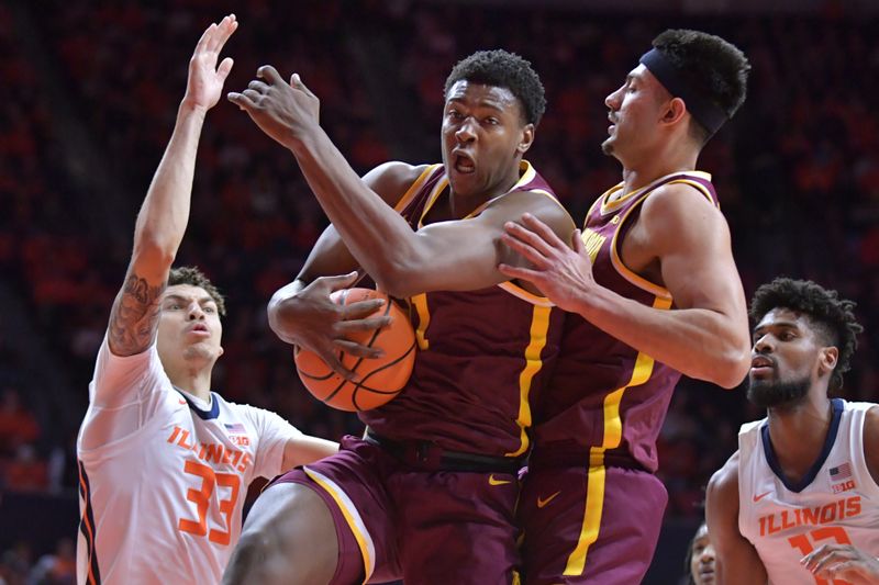 Feb 28, 2024; Champaign, Illinois, USA; Minnesota Golden Gophers forward Pharrel Payne (21) grabs a rebound during the first half against the Illinois Fighting Illini at State Farm Center. Mandatory Credit: Ron Johnson-USA TODAY Sports