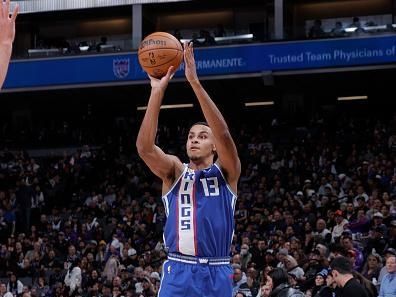 SACRAMENTO, CA - DECEMBER 2: Keegan Murray #13 of the Sacramento Kings shoots a three point basket during the game against the Denver Nuggets on December 2, 2023 at Golden 1 Center in Sacramento, California. NOTE TO USER: User expressly acknowledges and agrees that, by downloading and or using this Photograph, user is consenting to the terms and conditions of the Getty Images License Agreement. Mandatory Copyright Notice: Copyright 2023 NBAE (Photo by Rocky Widner/NBAE via Getty Images)