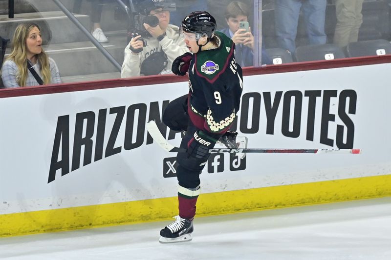 Feb 8, 2024; Tempe, Arizona, USA; Arizona Coyotes right wing Clayton Keller (9) celebrates after scoring a goal in the third period against the Vegas Golden Knights at Mullett Arena. Mandatory Credit: Matt Kartozian-USA TODAY Sports