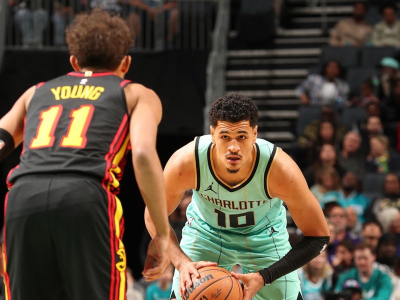 CHARLOTTE, NC - NOVEMBER 30: Josh Green #10 of the Charlotte Hornets handles the ball during the game against the Atlanta Hawks on November 30, 2024 at Spectrum Center in Charlotte, North Carolina. NOTE TO USER: User expressly acknowledges and agrees that, by downloading and or using this photograph, User is consenting to the terms and conditions of the Getty Images License Agreement. Mandatory Copyright Notice: Copyright 2024 NBAE (Photo by Kent Smith/NBAE via Getty Images)