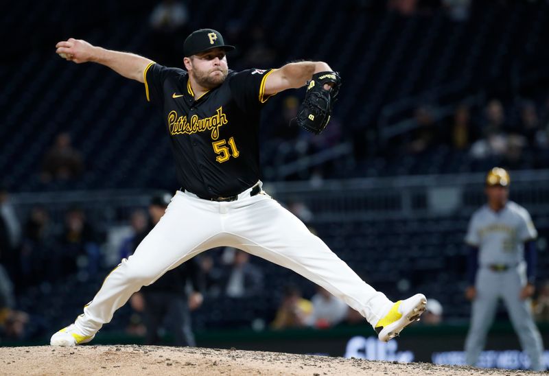 Apr 23, 2024; Pittsburgh, Pennsylvania, USA; Pittsburgh Pirates pitcher David Bednar (51) pitches against the Milwaukee Brewers during the ninth inning at PNC Park. Pittsburgh won 2-1.Mandatory Credit: Charles LeClaire-USA TODAY Sports