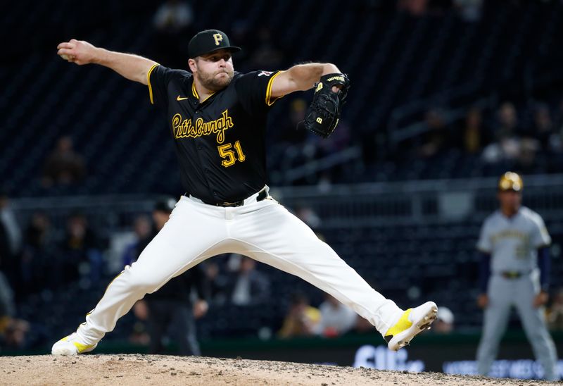 Apr 23, 2024; Pittsburgh, Pennsylvania, USA; Pittsburgh Pirates pitcher David Bednar (51) pitches against the Milwaukee Brewers during the ninth inning at PNC Park. Pittsburgh won 2-1.Mandatory Credit: Charles LeClaire-USA TODAY Sports