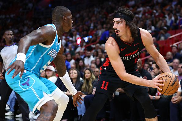 MIAMI, FLORIDA - DECEMBER 13: Jaime Jaquez Jr. #11 of the Miami Heat controls the ball against the Charlotte Hornets during the first quarter of the game at Kaseya Center on December 13, 2023 in Miami, Florida. NOTE TO USER: User expressly acknowledges and agrees that, by downloading and or using this photograph, User is consenting to the terms and conditions of the Getty Images License Agreement. (Photo by Megan Briggs/Getty Images)