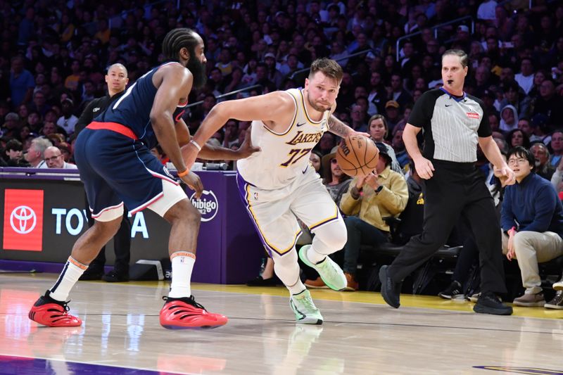 LOS ANGELES, CA - MARCH 2: Luka Doncic #77 of the Los Angeles Lakers drives to the basket during the game against the LA Clippers on March 2, 2025 at Crypto.Com Arena in Los Angeles, California. NOTE TO USER: User expressly acknowledges and agrees that, by downloading and/or using this Photograph, user is consenting to the terms and conditions of the Getty Images License Agreement. Mandatory Copyright Notice: Copyright 2025 NBAE (Photo by Juan Ocampo/NBAE via Getty Images)