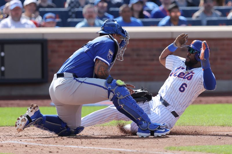 Apr 14, 2024; New York City, New York, USA; New York Mets designated hitter Starling Marte (6) is tagged out at home by Kansas City Royals catcher Salvador Perez (13) while trying to tag up on a fly ball by Mets right fielder Tyrone Taylor (not pictured) during the fourth inning at Citi Field. Mandatory Credit: Brad Penner-USA TODAY Sports
