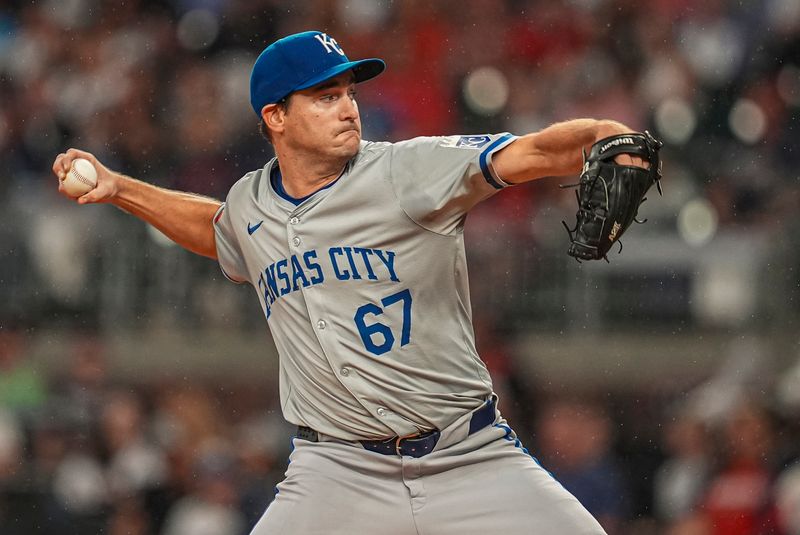 Sep 28, 2024; Cumberland, Georgia, USA; Kansas City Royals starting pitcher Seth Lugo (67) pitches against the Atlanta Braves during the first inning at Truist Park. Mandatory Credit: Dale Zanine-Imagn Images